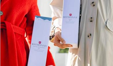 Ladies holding the Rathfinny wine box