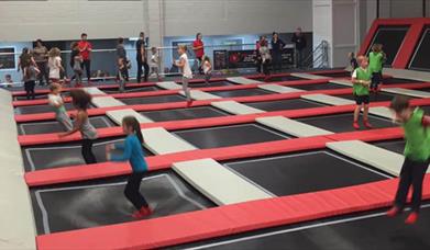 Indoor trampoline with children