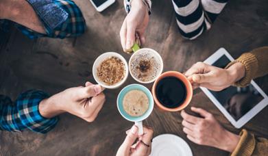 Friends sharing coffee