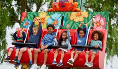 Image of kids on a ride at Drusillas Park