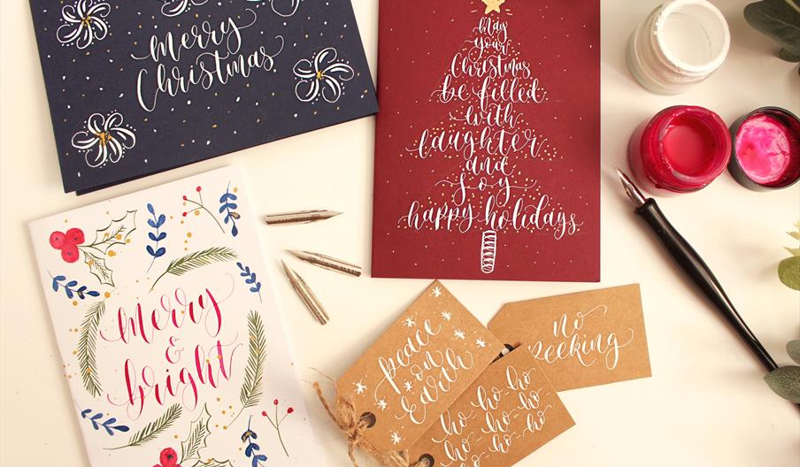 Christmas cards and calligraphy pens