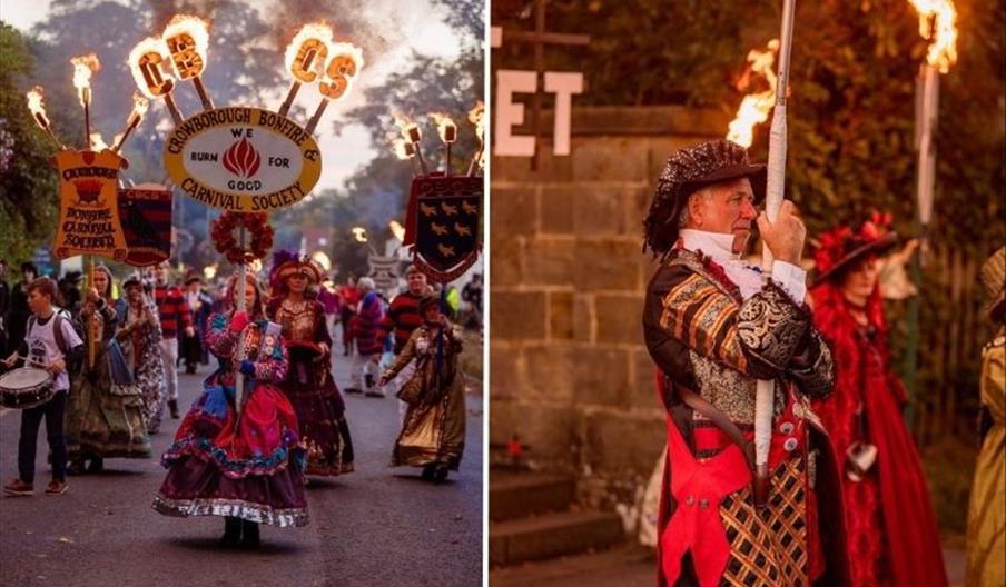 Participants in historical costumes taking part in the Crowborough Bonfire celebrations, carrying illuminated society banners and torches during the a