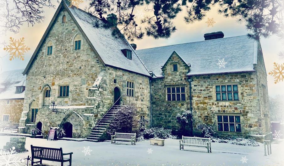 The old priory building of Michelham Priory, surrounded by snow