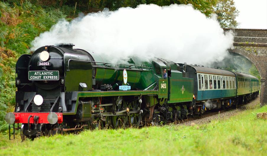 steam train travelling through tunnel