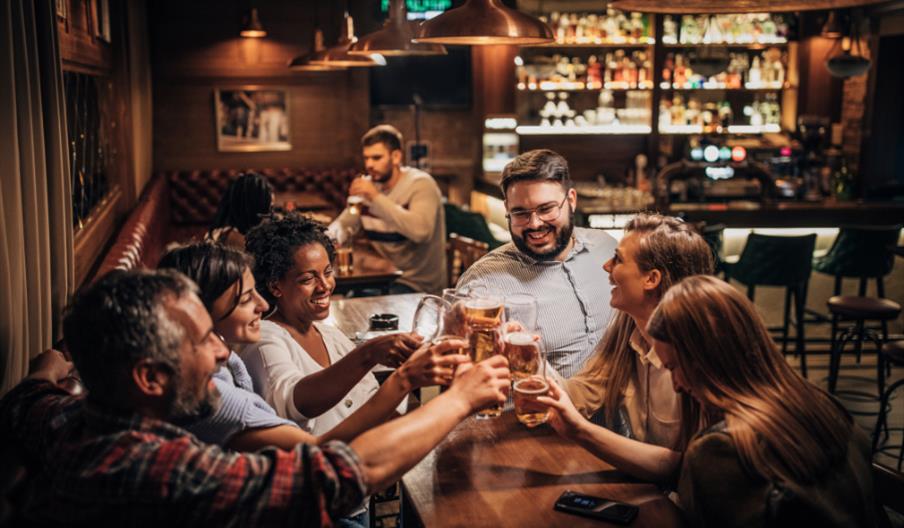 Friends enjoying drinks in the pub