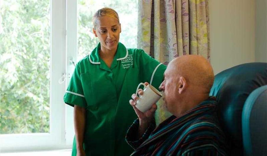 Hospice nurse with a paitent