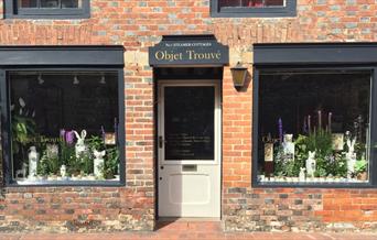 Shopfront of Objet Trouve, with windows either side