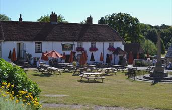 Outdoor pub garden with benches