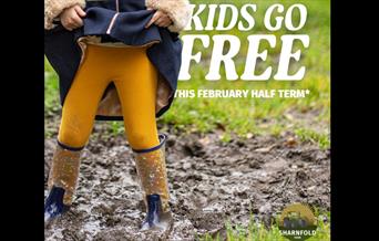 Image of a girl playing in the mud at Sharfold Farm