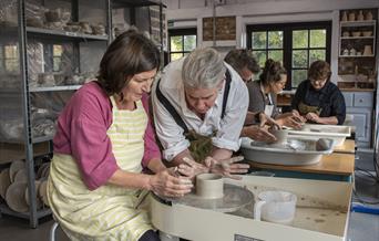 Clay Studio people making pottery