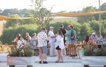 Group of people in the Gun Brewery outdoor seating