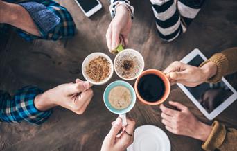 Friends sharing coffee