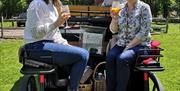 Gotwick Horse Drawn Carriages with two ladies