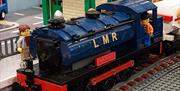A lego train at a lego train station
