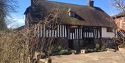 Exterior shot of Bridge Cottage's building 
