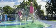 Drusillas girl in water fountain.png