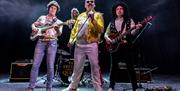 Headliners Fat Freddie and The Queens