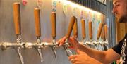 Image of the selection on the Gun Brewer beers on tap