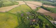 Aerial View of Pekes Manor, Houses and the land with surrounding countryside