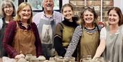 Image of a group of people who made pottery