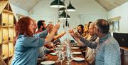 Image of a group of people cheering a glass of wine at Birchden Vineyards