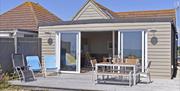 Outdoor decking with tables and chairs.