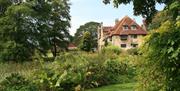 Exterior image of Michelham Priory and the gardens