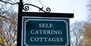 Self catering cottages sign