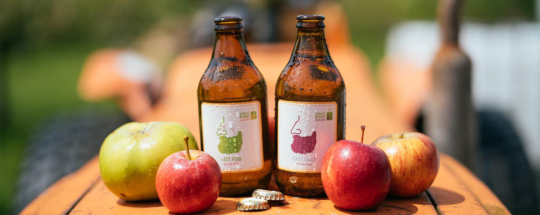 Bottles on Tractor with apples Bignose and Beardy