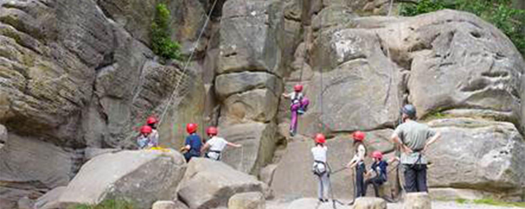 Children climbing Bowles Rock
