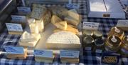 Assortment of cheeses on table