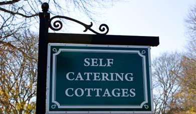 Self catering cottages sign