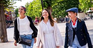 Tour guide showing visitors around Salisbury