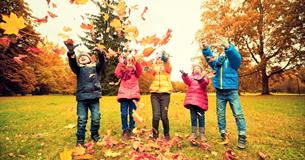 Children enjoying Autumn