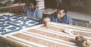 Women making quilts