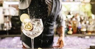 Gin pouring into glass
