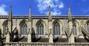 blue skies behind abbey windows
