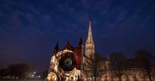 Cathedral illuminated with colourful lights