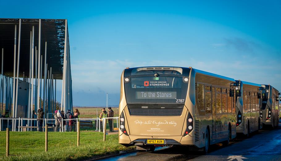 bus taking people to stonehenge