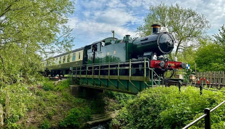 Locomotive 6695 travelling over the river ray bridge