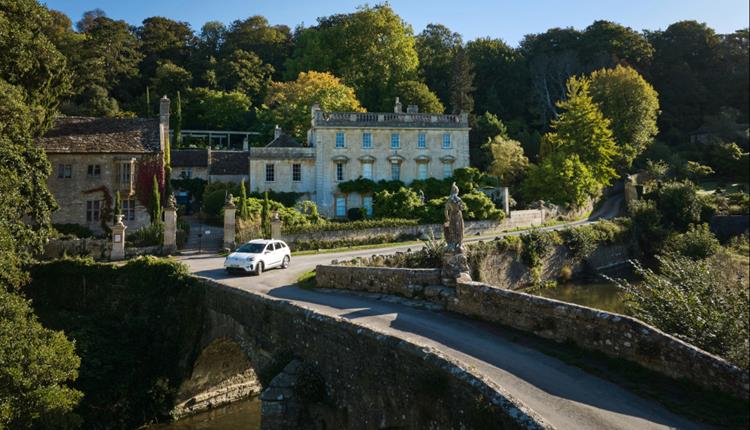 Drive and Stroll car in front of the beautiful Iford Manor