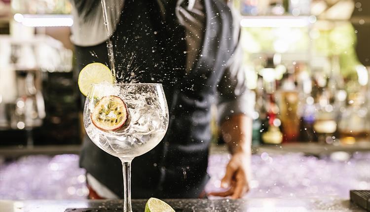 Gin pouring into glass