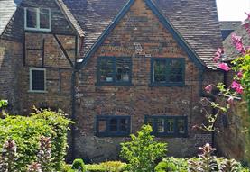 old brick house with formal garden