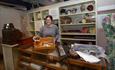 Woman showing museum collections