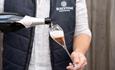 Bluestone sparkling rosé being poured into a glass