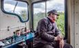 diesel loco driver looking out of cab window