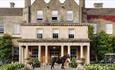 A horse outside Lucknam Park Hotel & Spa in Thickwood, near Bath