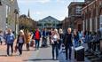 Shoppers outside McArthurGlen Designer Outlet Swindon