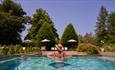 Lady in the swimming pool within the Spa at Lucknam Park in Thickwood, near Bath
