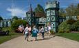 group of children running toward Adventure Castle playground